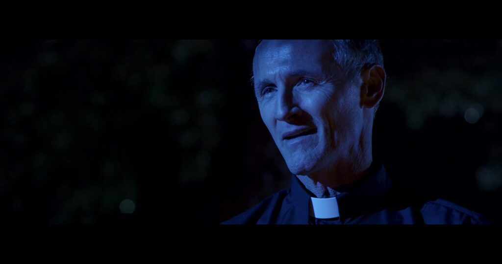 Colm Feore as Father Roman in 'Beast Within'